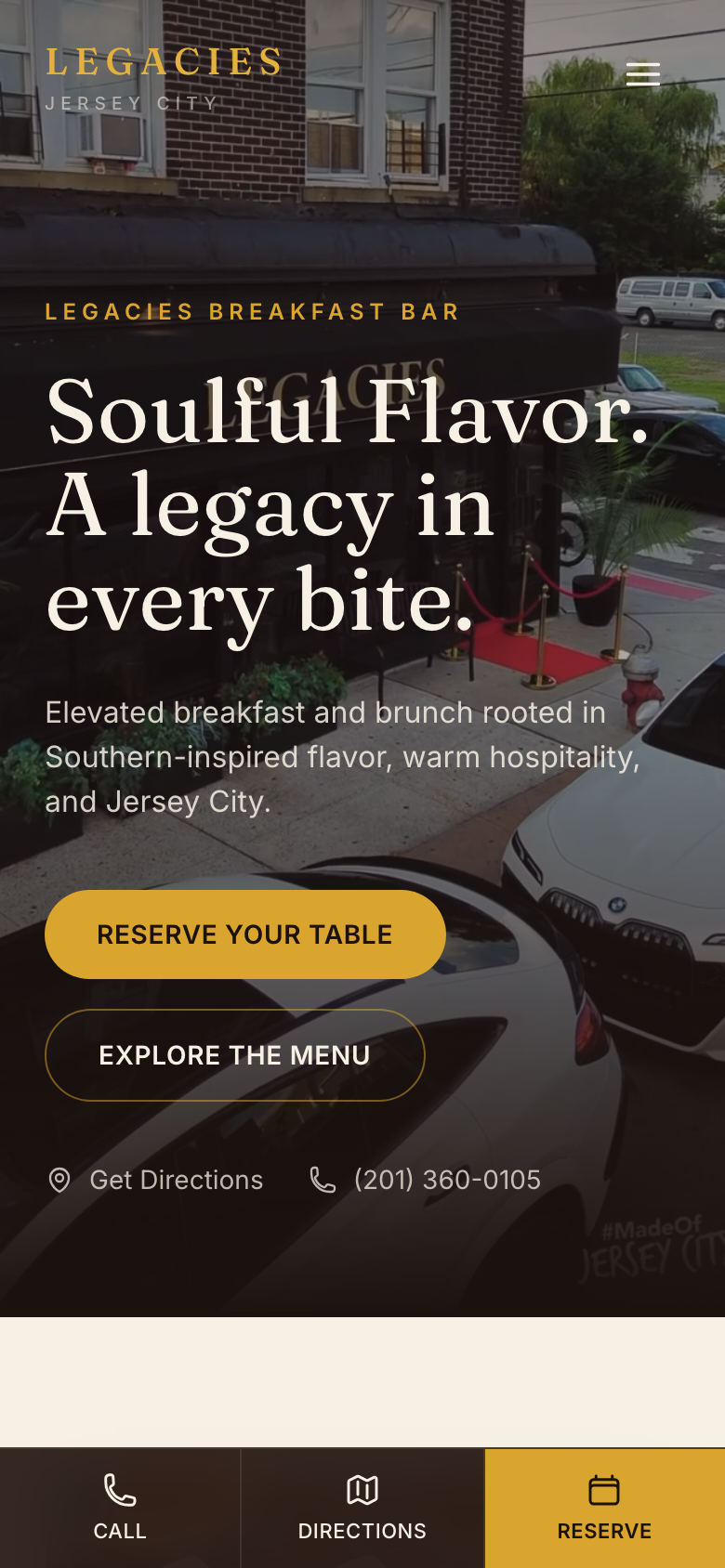 The Legacies Breakfast Bar restaurant website on a mobile phone, showing the full homepage experience including reservation and menu buttons